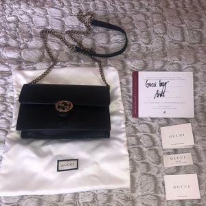 Gucci mini interlocking g cross body wallet/purse